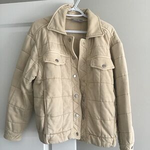 Oversized quilted beige jacket